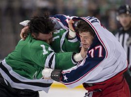 Jamie Benn (14) and Josh Anderson (77) tussle in the first period of the Dallas Stars and Columbus Blue Jackets game. (Image: Jerome Miron/USA Today)