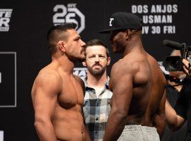 Rafael dos Anjos (left) and Kamaru Usman (right) face off before their main event fight at The Ultimate Fighter 28 Finale in Las Vegas. (Image: Zuffa/Getty)