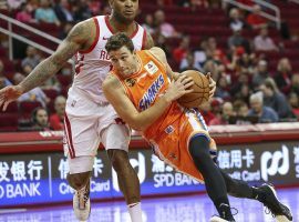 Former BYU star Jimmer Fredette playing in an exhibition game for the Shanghai Sharks against the Houston Rockets. (Image: Troy Taormina/USA Today)