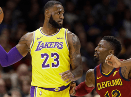 David Nwaba (right) from the Cavs guards LeBron James in his first game back in Cleveland as a member of the LA Lakers. (Tony Dejack/AP)