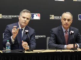 MGM Resorts CEO Jim Murren (left) and MLB commissioner Rob Manfred (right) announced a gaming partnership on Monday, the third for the casino firm. (Image: AP/ Seth Wenig)