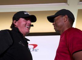 Tiger Woods and Phil Mickelson agreed to a $200,000 side bet on the first hole of their pay-per-view match in Las Vegas this Friday. (Image: Steve Marcus/Las Vegas Sun/AP)