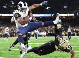 Rams RB Malcolm Brown leaps for a touchdown in the Superdome. (Image: Wally Skalij/LA Times)