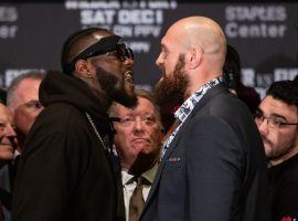 Deontay Wilder (left) and Tyson Fury (right) face off in the lead up to their heavyweight championship fight on Saturday. (Image: Esther Lin/Showtime)