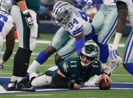 QB Carson Wentz from the Eagles gets sacked by the Dallas Cowboys in an overtime thriller. (Image: Getty)
