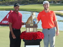 Jon Rahm (right) accepts his trophy from Tiger Woods (left) after winning the 2018 Hero World Challenge. (Image: Getty)