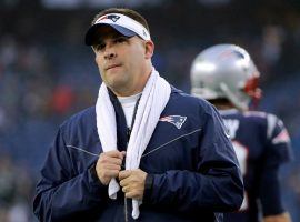 New England Patriots offensive coordinator Josh McDaniels supervising warm ups at the Patriots game. (Image: Elise Amendola/AP)