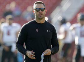 Kliff Kingsbury during warmups of a Texas Tech game at Iowa State. (Image: Charlie Neibergall/AP)