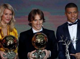 Ballon dâ€™Or winner Luka Modric (center) poses with Womenâ€™s Ballon dâ€™Or winner Ada Hegerberg and Raymond Kopa Trophy recipient Kylian Mbappe. (Image: AP)