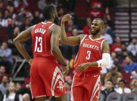 James Harden (13) and Chris Paul (3) celebrate after a successful three-point shot during a record setting night for the Houston Rockets. (Image: Troy Taormina/USA Today Sports)