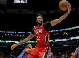 Anthony Davis from the New Orleans Pelicans grabs a rebound against the Oklahoma City Thunder. (Image: Derick E. Hingle/USA Today Sports)