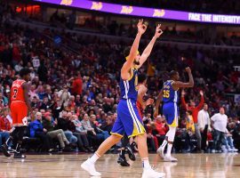 Klay Thompson's 14 3-pointers on October 29 broke the NBA record of 13, previously held by his sharp-shooting teammate Steph Curry. Thompson's record-setting performance was one of many brilliant ones by the game's biggest stars in the first half of the NBA season. (Photo: Mike DiNovo/USA Today Sports)