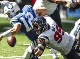Indianapolis quarterback Andrew Luck was pestered by Houstonâ€™s J.J. Watt and the rest of the defense in the Sept. 30 contest between the two teams. (Image: Houston Chronicle)