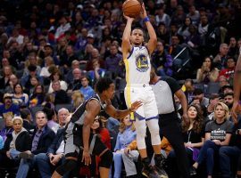 Steph Curry from the Golden State Warriors unleashes a three-point attempt against the Sacramento Kings. (Image: Cary Edmondson/USA Today Sports)