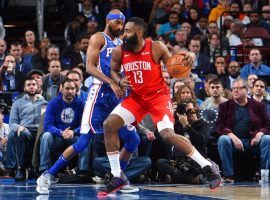 Corey Brewer from the Philadelphia Sixers defends Houston Rockets shooting guard James Harden at Wells Fargo Center in Philadelphia. (Image: AP)