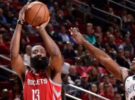 Houston Rockets guard James Harden takes a shot over the Brooklyn Nets guard Treveon Graham during Hardenâ€™s second straight 50-point game. (Image: Getty)