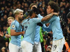 Leroy Sane (right) celebrates with his teammates after scoring the winning goal in Manchester Cityâ€™s 2-1 victory over Liverpool on Thursday. (Image: AFP)