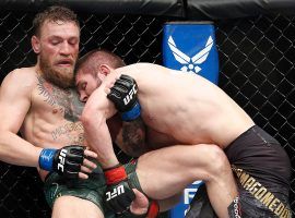 Khabib Nurmagomedov (right) and Conor McGregor (left) each received suspensions for their roles in the brawl that took place after UFC 229. (Image: John Locher/AP)