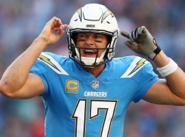 Philip Rivers, quarterback from the LA Chargers, calls a play during a game in Carson, California. (Clive Rose/Getty)