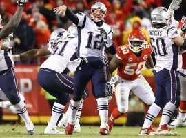 Tom Brady (12), quarterback for the New England Patriots, drops back to pass against the Kansas City Chiefs in the AFC Championship Game in Arrowhead Stadium in Kansas City. (Image: AP)