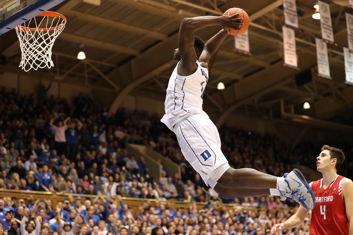 Zion Williamson from Duke throwing down a dunk against Hartford at Cameron Indoor Stadium in Durham, North Carolina. (Image: Jaylynn Nas/Getty)