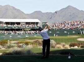 Phil Mickelson tees off at the iconic 16th hole at TPC Scottsdale at the Waste Management Phoenix Open. (Image: AP)