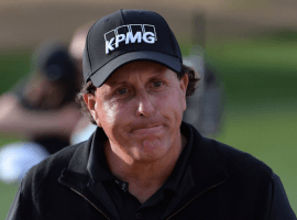 Phil Mickelson shows his frustration after a rough Sunday at the Desert Classic, which he lost after holding a two-stroke lead going into the final round. (Image: Getty)