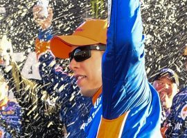 Brad Keselowski celebrates after winning at Atlanta Motor Speedway on Sunday despite suffering from a stomach virus. (Image: Scott Cunningham/AP)