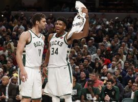 Brook Lopez and Giannis Antetokounmpo from the Milwaukee Bucks sharing intel during a timeout at Fiserv Forum in Milwaukee. (Image: Brian Spurlock/USA Today Sports)