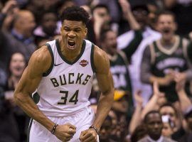 Giannis "Greek Freak" Antetokounmpo from the Milwaukee Bucks gets fired up after scoring a basket during a game in Milwaukee. (Image: Jeff Hanisch/USA Today Sports)