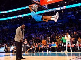 Rookie Hamidou Diallo of the OKC Thunder dunks over ex-player Shaquille O'Neal during the NBA dunk contest at Spectrum Center in Charlotte, North Carolina. (Image: Bob Donnan/USA Today Sports)
