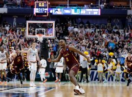 NCAA tournament buzzer beaters will now be automatically reviewed, even if they canâ€™t change who will win the game. (Image: Tony Gutierrez/AP)