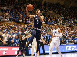 Senior guard Alex Coepland from Yale drives to the basket against Duke in Durham, North Carolina. (Image: Keenan Hairston/Yale Daily News)