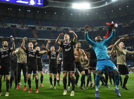 Ajax players celebrate after eliminating Real Madrid from the Champions League on Tuesday. (Image: David Ramos/Getty)