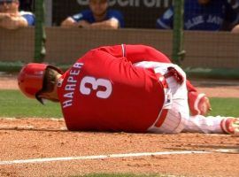Phillies CF Bryce Harper clutches his ankle after he is hit by a pitch in a spring training game against the Toronto Blue Jays in Clearwater, Florida. (Image: NBC Sports Philadelphia)