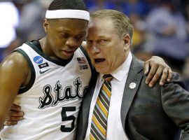 Michigan State guard Cassius Winston consults with head coach Tom Izzo in a March Madness Sweet 16 game against LSU in Washington, DC. (Image: Porter Lambert/USA Today Sports)