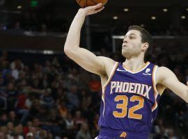 The Phoenix Suns Jimmer Fredette takes a shot during a loss against the Utah Jazz in Salt Lake City. (Image: AP)