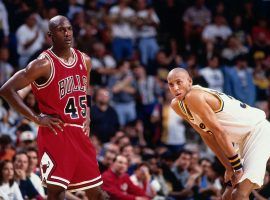 Michael Jordan (45) of the Chicago Bulls returns for his first game back after retirement on March 19, 1995 against Reggie Miller and the Indiana Pacers Market Square Arena in Indianapolis, Indiana. (Image: Barry Gossage/Getty)