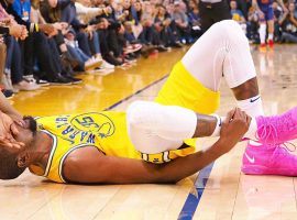 Kevin Durant from the Golden State Warriors injuries his ankle against the Phoenix Suns at Oracle Arena in Oakland, California. (Image: Getty)