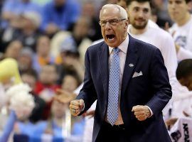 A fired-up Roy Williams, head coach of North Carolina, on the sidelines of a March Madness second round game in Columbus, Ohio. (Images: Elsa/Getty)