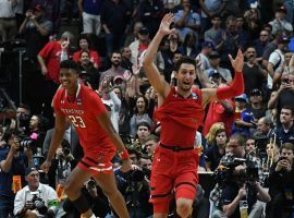 Texas Tech's Jarret Culver (23) and Davide Moretti (right) celebrate their victory over top-ranked Gonzaga in the March Madness Elite 8 in Anaheim, California. (Image: Robert Hanashiro/USA Today Sports)