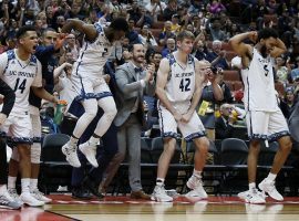 Max Hazzard (2) and the UC Irvine bench react to a blowout over Cal State Fullerton in the Big West tournament championship in Anaheim, California. (Image: Alex Gallardo/AP)