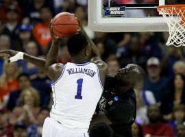 Duke's Zion Williamson (1) drives to the basket against UCF's Tacko Fall in the NCAA Round of 32 in Columbia, SC. (Image: Getty)