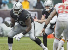 Guard Kelechi Osemele (70) of the Oakland Raiders protects QB Derek Carr in a game against the Kansas City Chiefs in Oakland, CA. (Image: Getty)