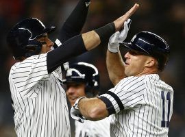 NY Yankees outfielder Mike Tauchman (left) congratulates Brett Gardner (11) after hitting a grand slam against the Boston Red Sox at Yankee Stadium in the Bronx. (Image: Adam Hunger/USA Today Sports)