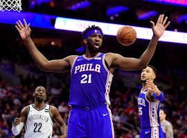 Joel Embiid, center for the Philadelphia Sixers, celebrates after throwing down a dunk against the Brooklyn Nets in the opening round of the 2019 NBA playoffs. (Image: Corey Perrine)