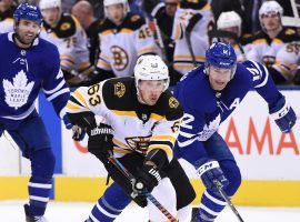 The Boston Bruins and Toronto Maple Leafs will be forced to play each other in the first round of the NHL playoffs due to the division format used by the league. (Image: Dan Hamilton/USA Today Sports)