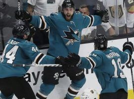 San Jose Sharks winger Barclay Goodrow (center) celebrates after scoring the overtime winner in Game 7 of their series against the Vegas Golden Knights. (Image: Jeff Chiu/AP)