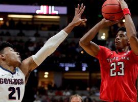 Texas Tech's Jarrett Culver (23) shoots over Gonzaga's Rui Hachimura in a March Madness Elite Eight game in Anaheim, CA. (Image: Jae C. Hong/AP)