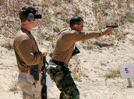 Tiger Woods training with Navy SEALs outside of San Diego, CA. (Image: Chief Journalist Deborah Carson/US Navy)